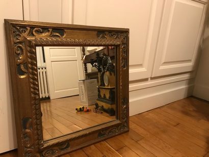 Mirror in a frame with carved corners. 
Work...