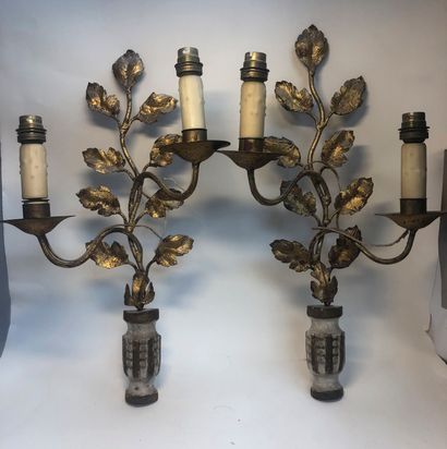 Pair of gilded sheet metal sconces decorated...