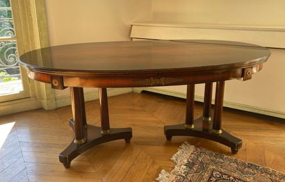 Oval table in mahogany veneer with two tripod...