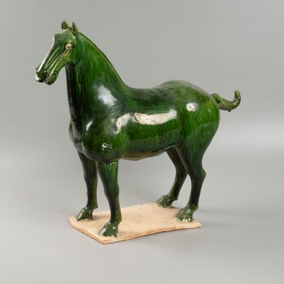 CHINA horse in green enamelled clay. Mod...