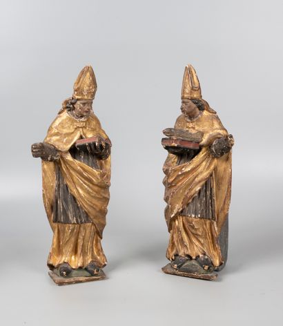 Deux figures d’applique en bois polychromé...