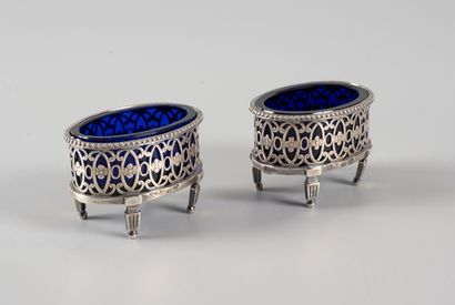 Pair of oval saltcellars with openwork decoration...