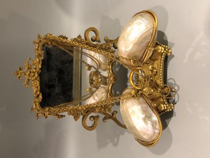 Mirror in gilded metal, 
mother of pearl...