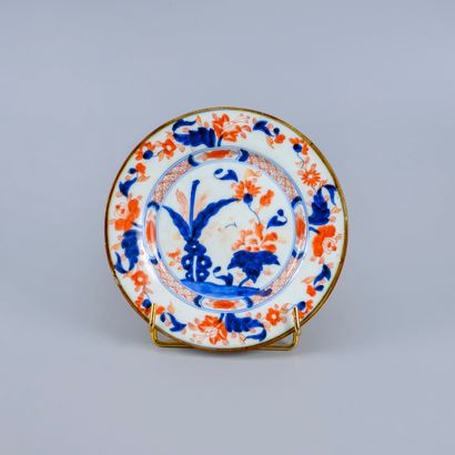 imari plate with red and blue floral decoration...
