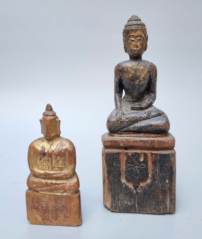 Thailand 
Two Buddha statuettes in wood 
Xxeme...