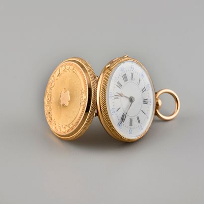 Pocket watch in 18K gold, the enamelled dial...