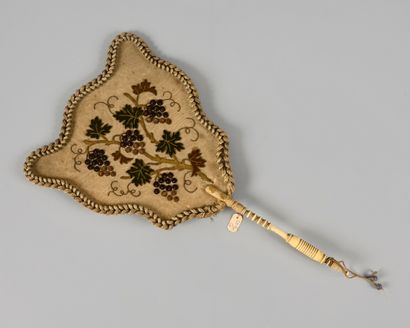  Hand screen, turned bone handle, leaf with embroidered decoration of vine shoots...