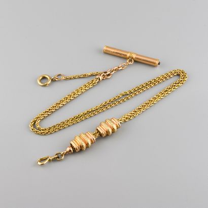  Chain of watch two golds 
L : 36 cm. 
Gross weight : 34,1 g. 
(deformations and...