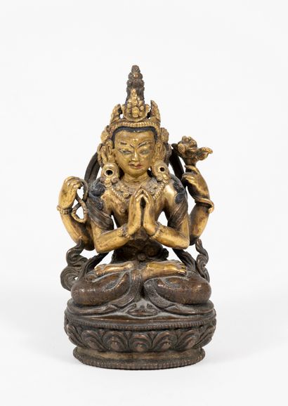 null TIBET figure in prayer, hands joined. Gilded bronze, trace of polychromy, wear....