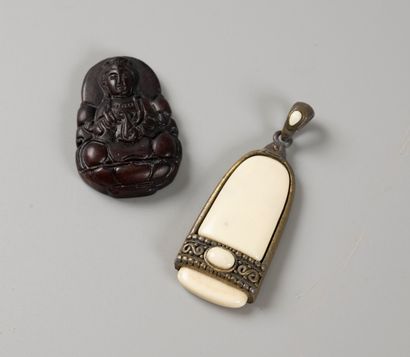 ASIA, 20th century 
Two pendants, one of...