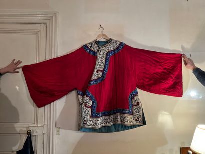 CHINA 
Jacket with red background and embroidery...