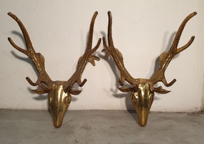 Pair of deer heads in gilded metal signed...