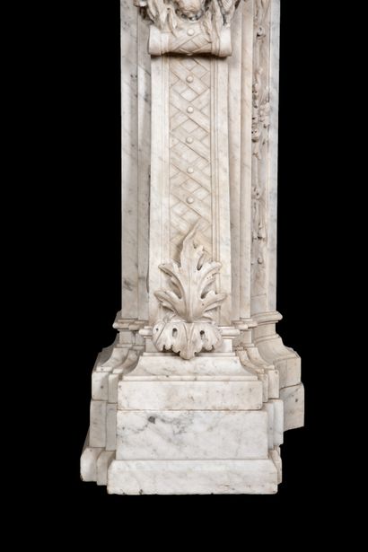  Neo Classique mantel. 
Lintel topped by a sculpted putto in statuary marble holding...