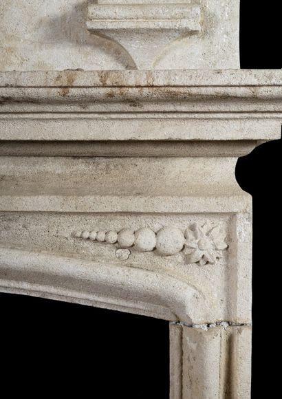  Louis 13 mantel in hard stone. 
Console jambs supporting a curved lintel. 
Trumeau...