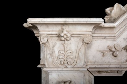  Neo Classique mantel. 
Lintel topped by a sculpted putto in statuary marble holding...