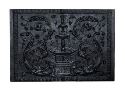 null Renaissance fireback. 

Centerpiece decorated with a double fountain topped...