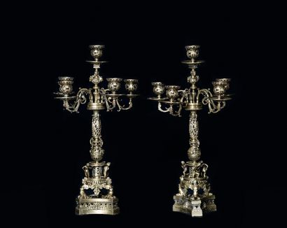  Pair of candlesticks Renaissance style. 
Richly decorated with foliage, heads of...