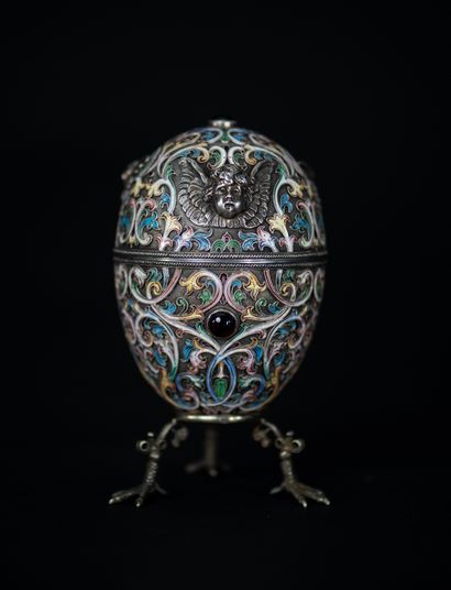  Egg-shaped box. 
In the taste of the Fabergé house, decorated with angels' faces...
