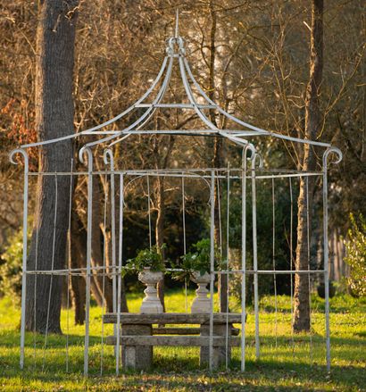  Pergola. 
Of hexagonal form, offering an opening marked by a curve, surmounted by...