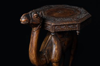  Pedestal table. 
Orientalist style with the image of a dromedary supporting an octagonal...