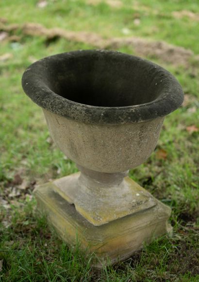  Baptismal basin in stone. 
Oblong shape resting on a molded foot and a base. 
18th...