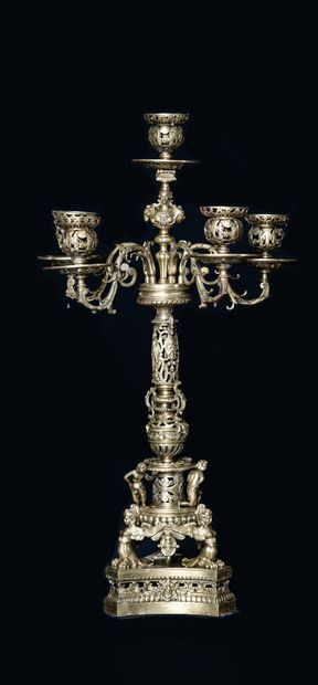  Pair of candlesticks Renaissance style. 
Richly decorated with foliage, heads of...