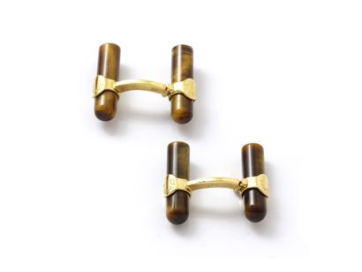 Pair of articulated cufflinks in gold 750...