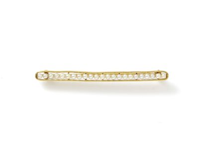 null Broche barrette en or 750 millièmes, décorée d'une ligne de petites perles probablement...