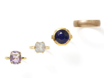 null Lot in gold 750 thousandths, composed of 3 rings decorated with an amethyst...