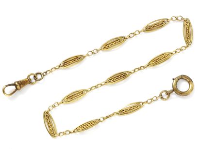 null Chain of watch in gold 750 thousandths made up of filigree links, decorated...