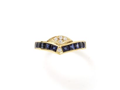 null Ring in gold 750 thousandths, decorated with lines of calibrated sapphire in...