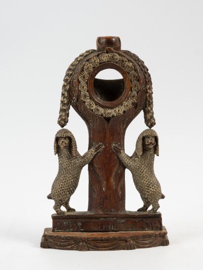 Carved wood watch holder, decorated with...