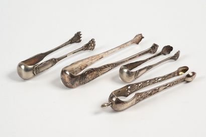 null THREE SILVER SUGAR PENS (LOT). 
- Model with openwork branches ending in spoons,...