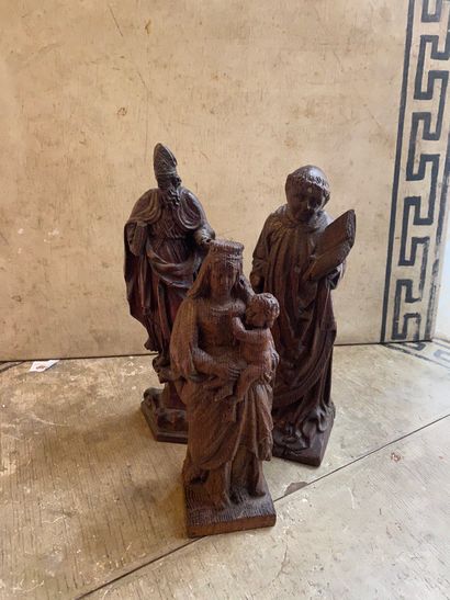 null Trois saints en bois sculpté