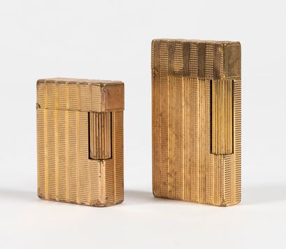 null DUPONT. 
A set of two golden lighters