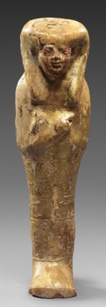 EGYPTE Rare oushebti, directeur des deux greniers. La statuette dorée est coiffée...