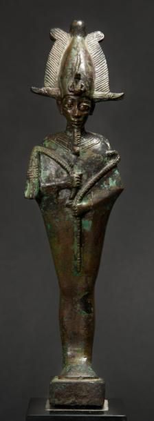 EGYPTE Statuette du Dieu Osiris.Représenté debout, tenant le sceptre hekat et le...