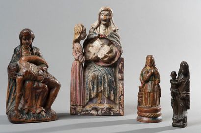 null Ensemble de sujets en bois polychrome représentant une Piéta, Sainte Barbe,...