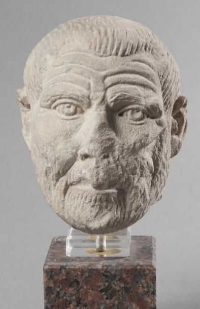 null Tête représentant un portrait d?homme barbu en calcaire. Art romain, IIIe siècle....