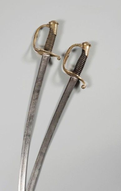 null France, 

Deux sabres sous-officier d’infanterie

Modèle 1821

Monture en laiton,...