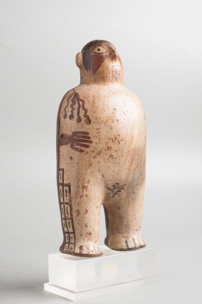 null Personnage féminin debout.

Terre cuite polychrome.

Pérou. Culture Nazca, vers...