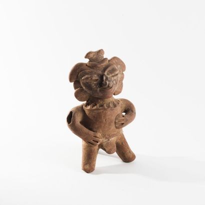 null Personnage debout stylisée (sifflet)

Terre cuite brune.

Mexique. Culture Maya,...