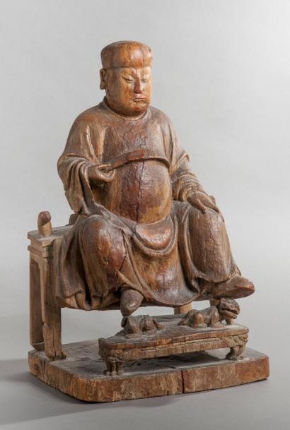 null Sujet en bois naturel représentant un sage du Tao assis sur un trône, les pieds...