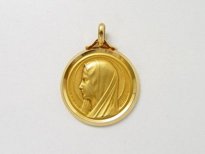 Médaille en or 18 K représentant le profil...