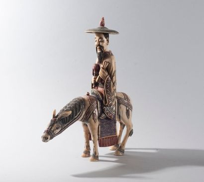 null Sujet en ivoire représentant Toba sur sa mule, la tête mobile.

Chine, copie...