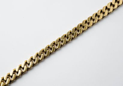 null Bracelet chaine gourmette en or jaune. Poids : 84,4 g.