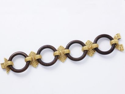 null GOOSSENS PARIS Bracelet composé de 4 anneaux en bois reliés entre eux par des...