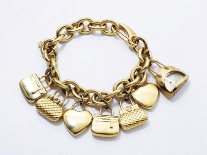 null MOSCHINO ''TIME 4 SHOPPING'' Bracelet en métal doré retenant 7 charms dont un...