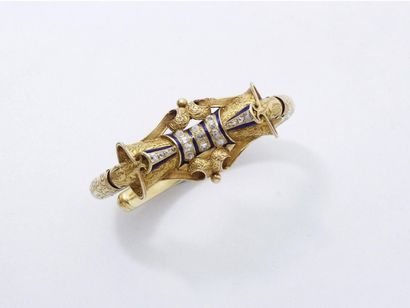 null Délicat bracelet jonc rigide ouvert à charnière en or 750 millièmes dans un...