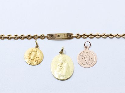 null Lot en or 750 millièmes, composé de 3 médailles religieuses et d'un bracelet...